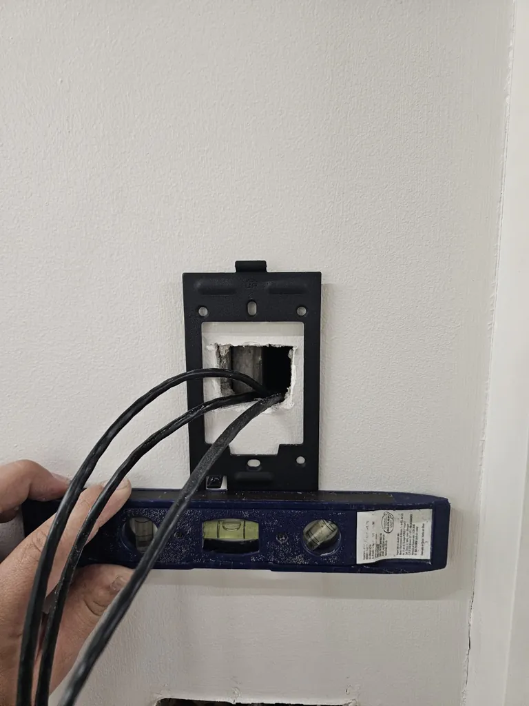 Nivel de burbuja utilizado para comprobar la alineación del soporte del terminal